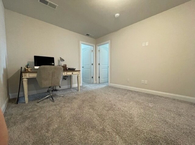 Landing area at top of stairs in identical t/h - 866 Longleaf Ln