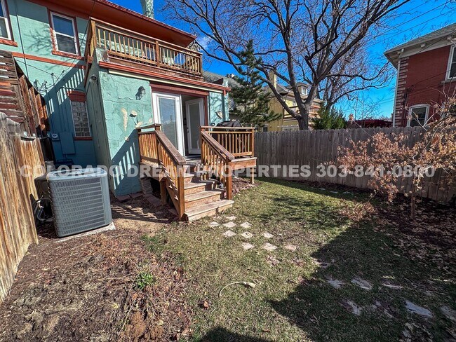 Building Photo - A home where old-world charm meets modern sophistication!