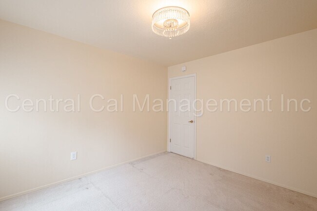 Building Photo - 4 Bedroom/2.5 Bath Home with Paid Solar an...