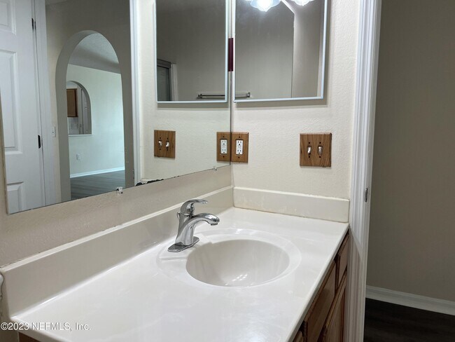 Building Photo - 6580 Gentle Oaks Dr N