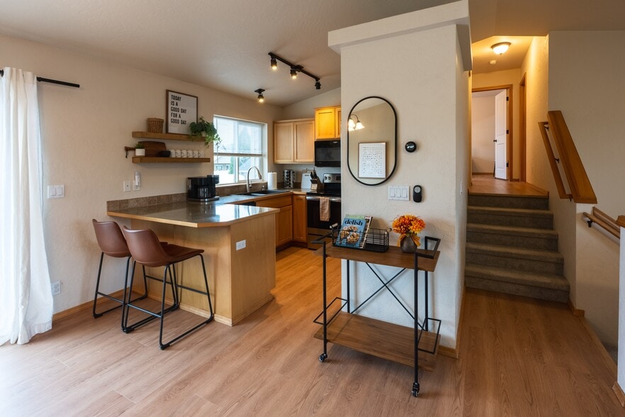 Kitchen - Large Pantry - Keurig and traditional coffee maker included. Hall leading to two bedrooms - 2805 W Dumont Dr