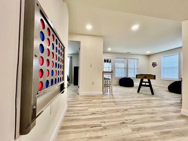 Building Photo - Beautiful NEW Ranch Home with a large deck & games