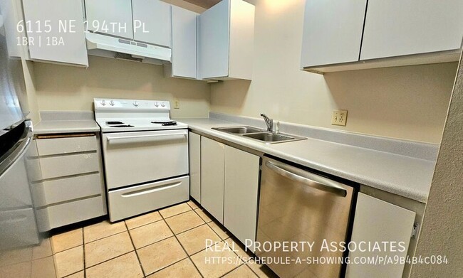 Building Photo - Quiet Apartment in Kenmore *Covered Parkin...