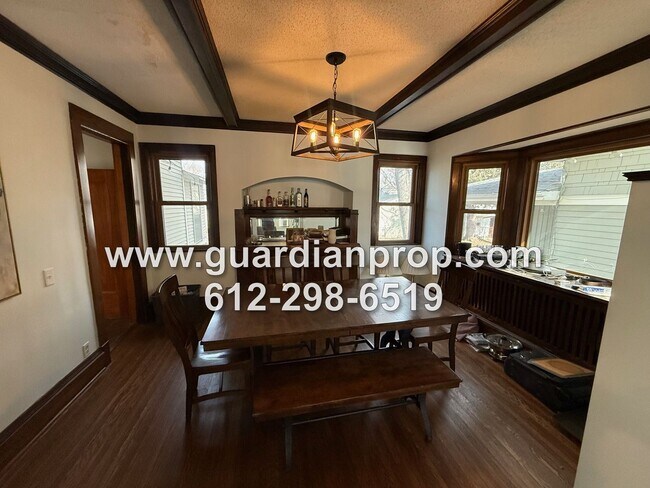 Building Photo - Merriam Park House Available May 1st, Updated Kitchen, Office, Fenced Yard, 2 Car Garage