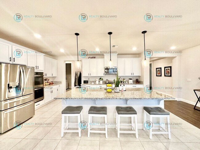 Building Photo - Welcome to your dream home, where modern elegance meets unparalleled convenience!