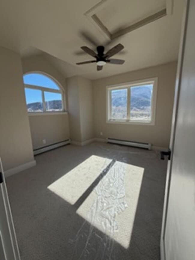 Building Photo - Spacious 4-Bed + Loft, 2.5-Bath Home with Stunning Mountain Views