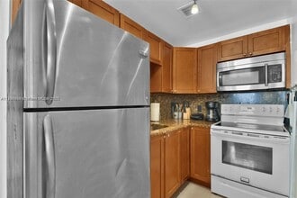 Building Photo - 6966 Byron Ave