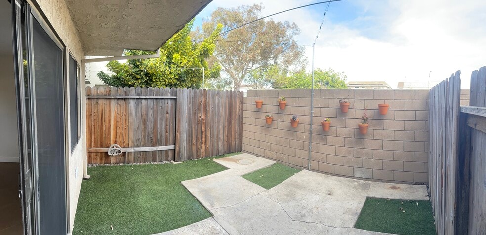 Private back yard/patio with string lights - 16622 Jib Cir