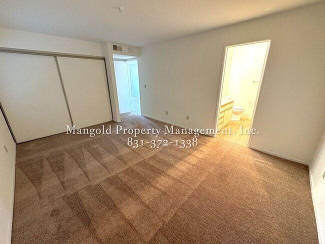 Building Photo - Spacious 2-Bed, 2-Bath Condo with Fireplac...
