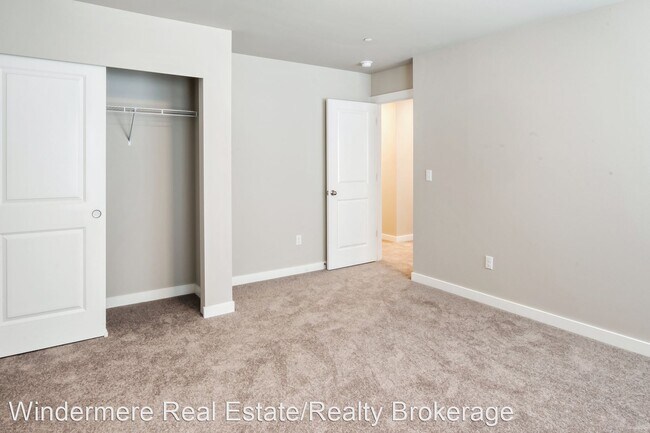 Building Photo - 4 br, 2.5 bath House - 8419 63rd St NE