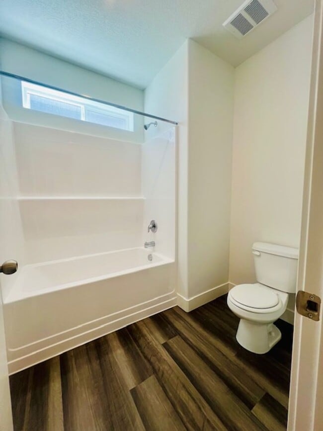 Building Photo - Brand-new Condo Conveniently Located in Ri...