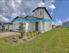 Building Photo - 4/2.5 with fenced yard