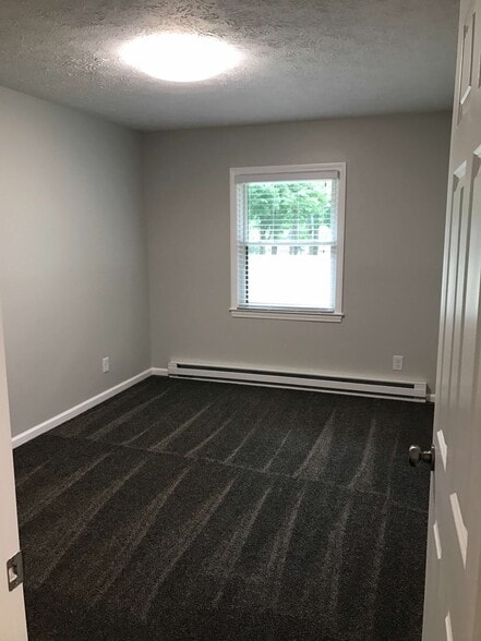 Bedroom 3. Front. Street/channel view. - 874 A Pleasant Ridge Rd