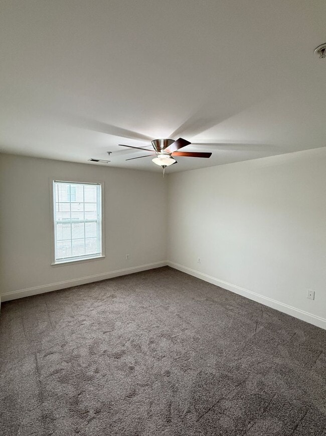 Building Photo - Spacious 4-Bedroom Townhome with Garage in Prime Columbia/Elkridge Location