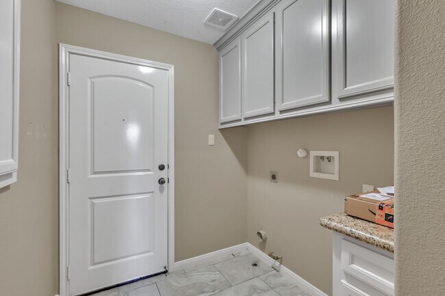 Building Photo - One story, and a 3-car garage!