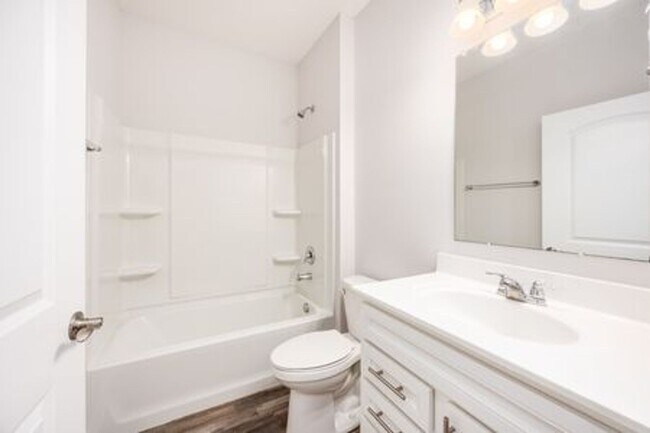 Building Photo - Updated 3-Bedroom Home with 3 Baths, Open-Concept Layout, Luxury Flooring & Bright Modern Kitchen