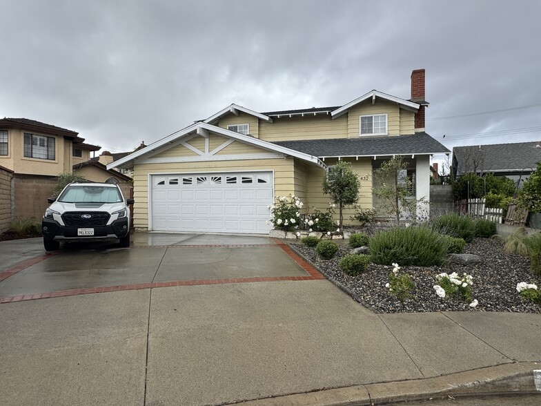 Freshly landscaped front yard. Room for 2-3 cars in the driveway - 432 E 212th St