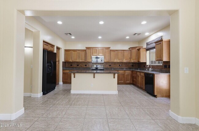 Building Photo - 15372 W Dahlia Dr
