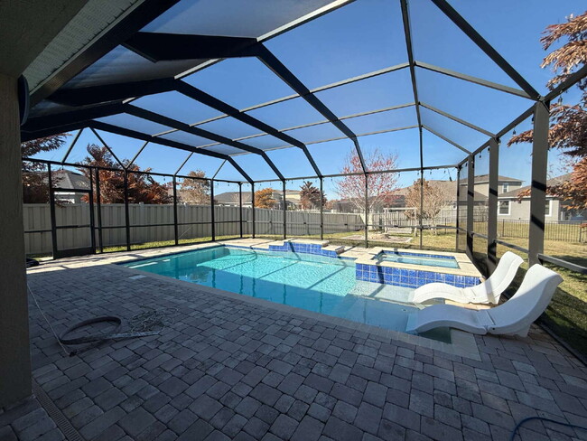 Building Photo - 4BR, 2.5BA home with resort style outdoor living!