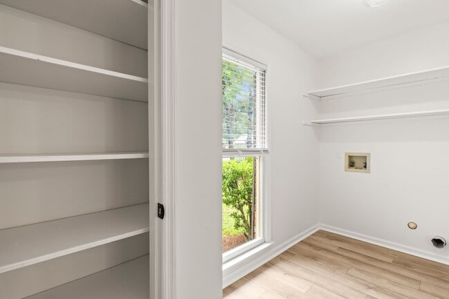 Building Photo - Renovated Home on Large Corner Lot in Coveted Strathy Hall