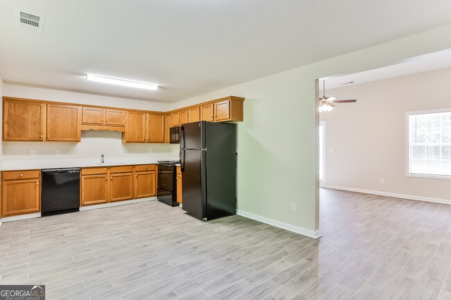 Building Photo - 719 Woodwind Dr