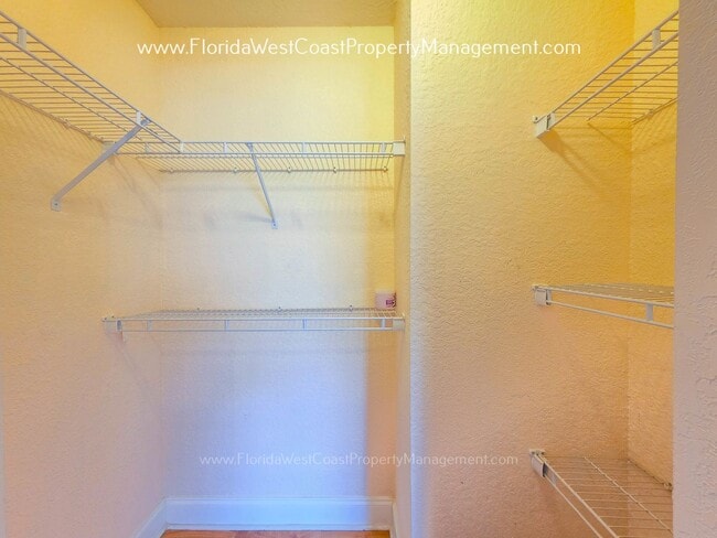 Building Photo - MOVE IN READY! LARGE 2 BEDROOM/2 BATH PLUS ATTACHED GARAGE! TILE/LVP THROUGHOUT!