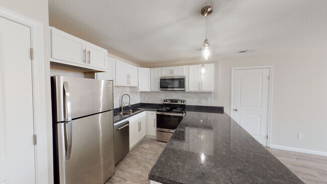 Building Photo - Free Months Rent! Beautiful 1-Bedroom West...