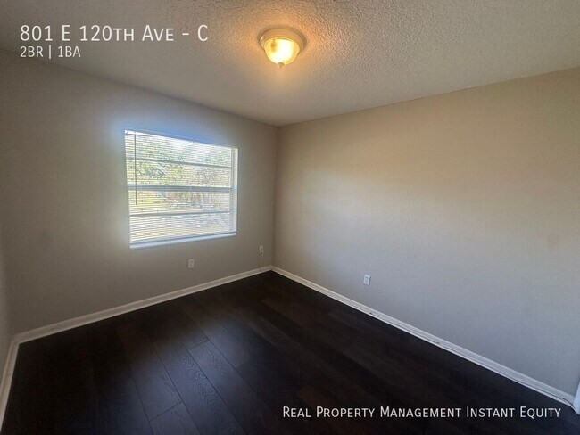 Building Photo - 801 E 120th Ave