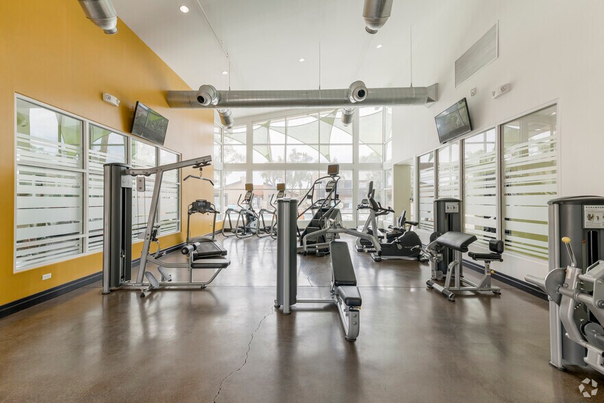 24-Hour Fitness Center w/ Spin & Yoga Room - Onnix Apartments