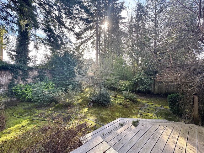 Building Photo - Stunning Bellevue Home with Lush Gardens &...