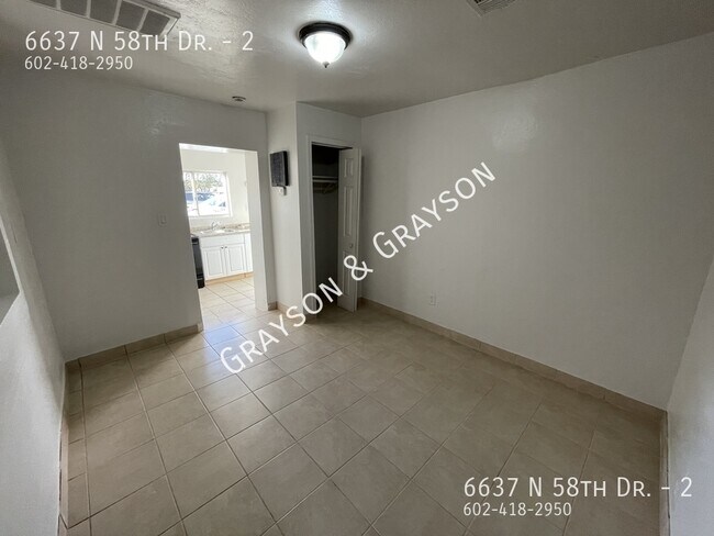Building Photo - 6637 N 58th Dr