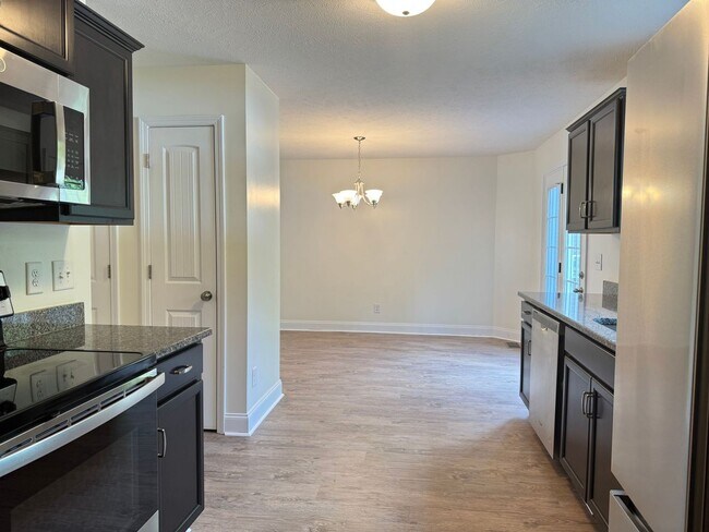 Building Photo - Move in Special! Beautiful Home Built in 2021! Open Floor Plan with 4bed/2.5 Bath and Fenced yard!