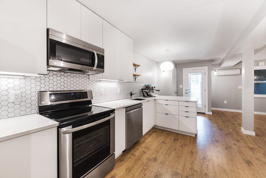 Kitchen looking out to front entrance - 523A Irving St NW