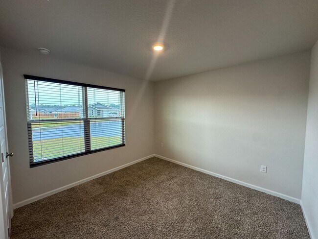 Building Photo - 4 bedroom 2 bath home in the Woodlands Subdivision in Milton, FL!