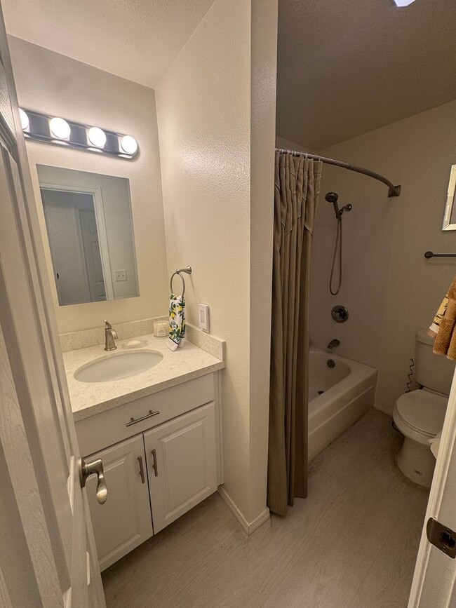 Building Photo - Gorgeous Condo in Seward Park with 2 Parking Spaces, Steps Away from Pool with Water View!
