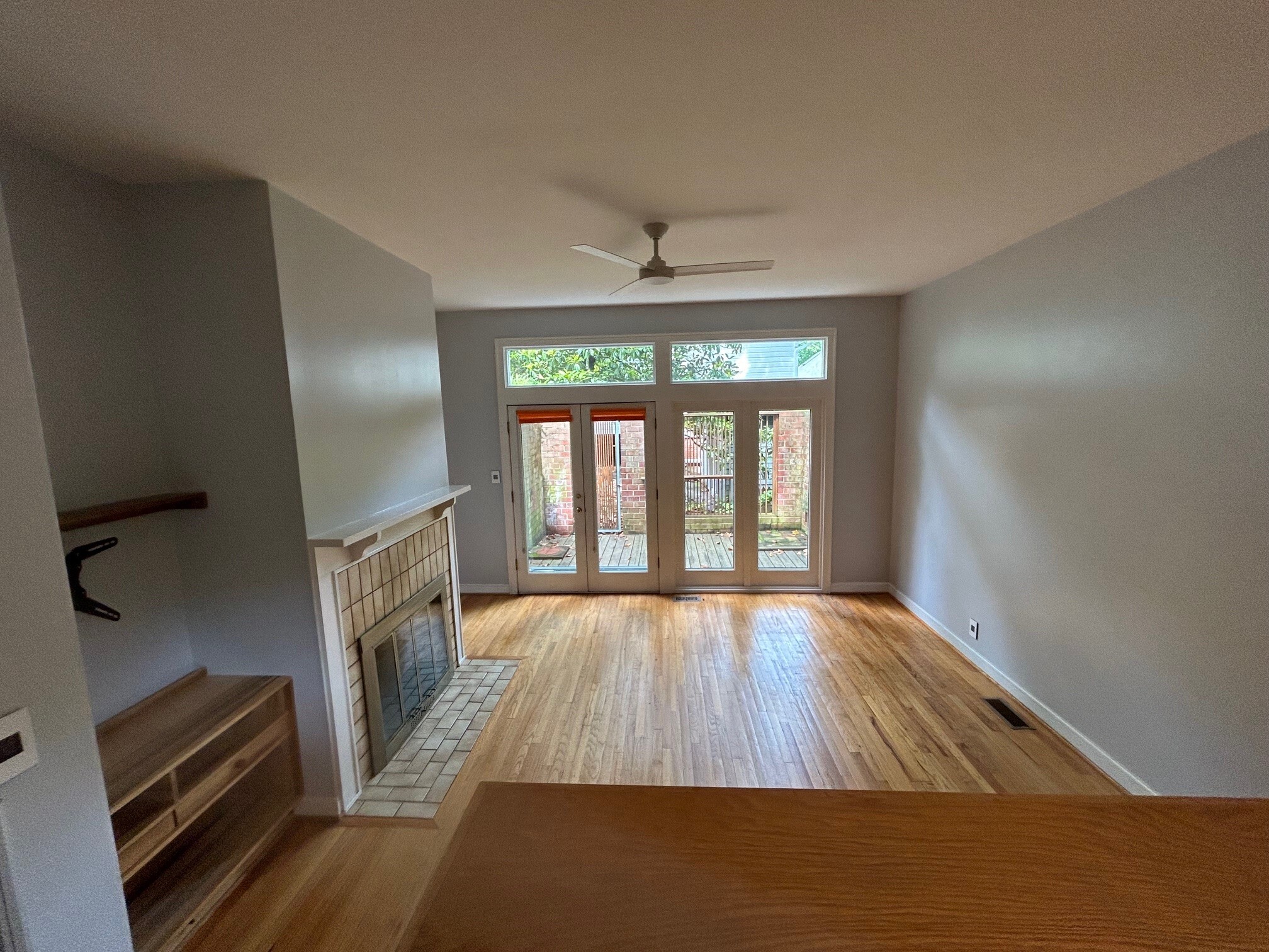 Spacious living room has French doors to courtyard - 407 McCauley St