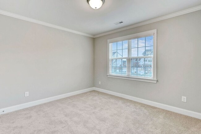 Building Photo - MOVE IN READY! – Gorgeous 4BR/4BA Townhome in Villages of Apex, 1 mile to DT Apex!