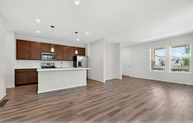 Building Photo - Beautiful 3 bed, 3 bath townhome in the lovely Painted Prairie Community!