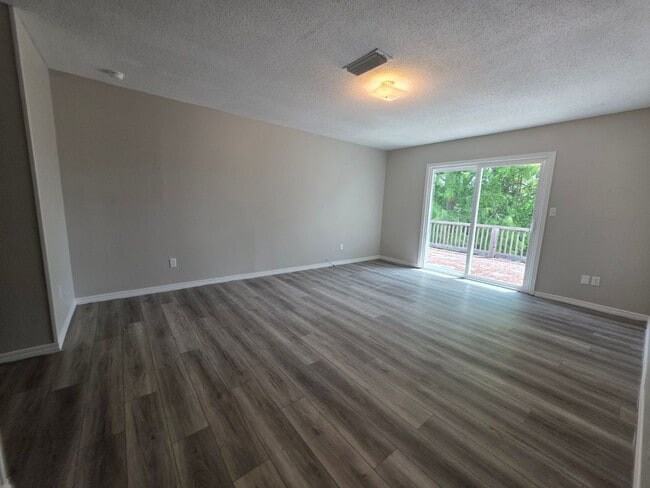 Building Photo - Waterfront Escape with Sunrise Views and S...