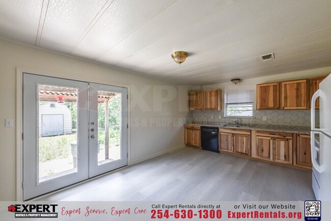 Building Photo - A cozy 3-bedroom, 2-bathroom home nestled ...