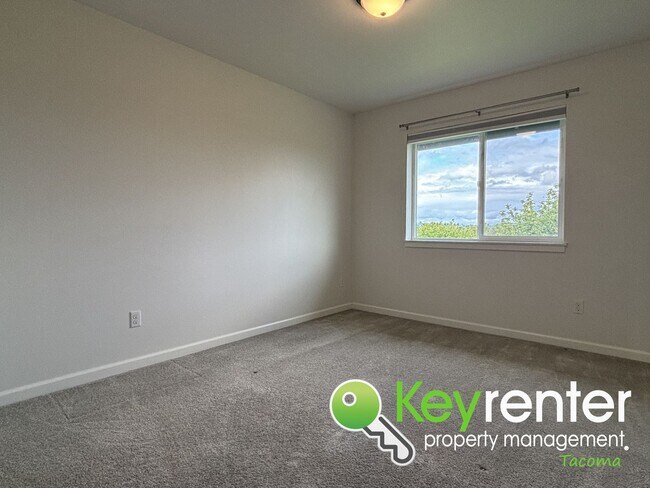 Building Photo - Stylish 4-Bedroom Home with Finished Basem...
