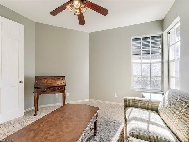 Building Photo - Turnkey 2-bedroom plus den villa, perfectly situated to capture stunning golf course and lake vie...