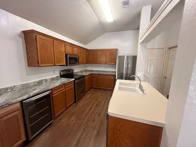 Building Photo - NEW IN MANAGEMENT - AVAILABLE NOW