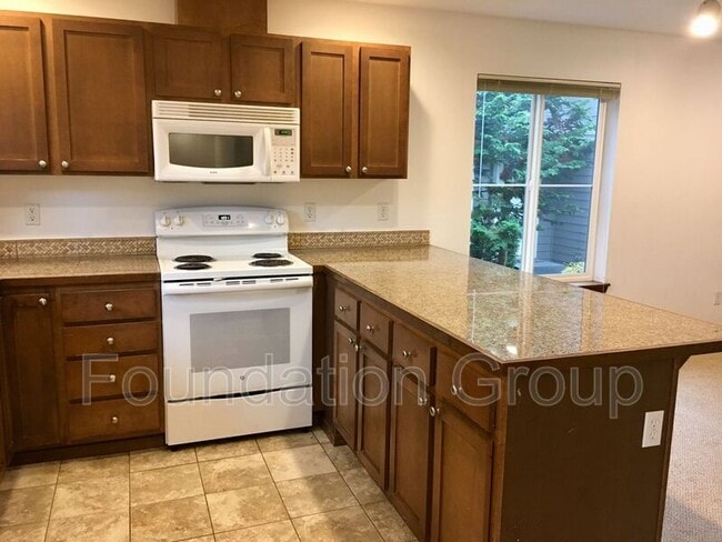 Building Photo - 12545 Roosevelt Way NE