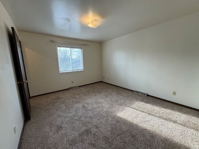 Building Photo - STOP SCROLLING — THIS TOWNHOUSE HAS IT ALL!