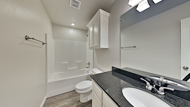 Building Photo - 2 Bedroom 2 Bathroom 2 Car Garage Duplex close to Broadway Extension, a short distance from Edmon...