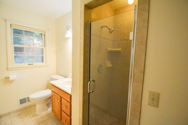 Building Photo - 4 Bed, 2 Bath Home for Rent – Unique Design & Retro Charm