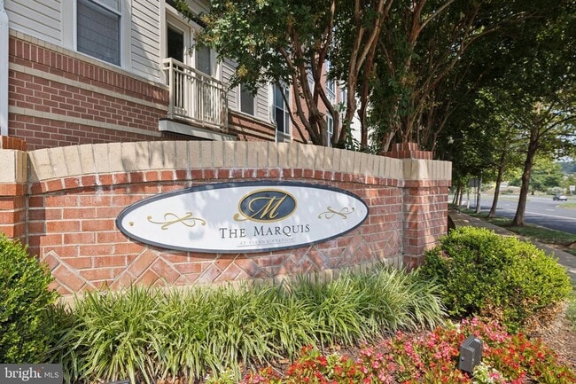 Building Photo - This townhouse style condo is located across the street from the Vienna Metro Station (Orange Line).