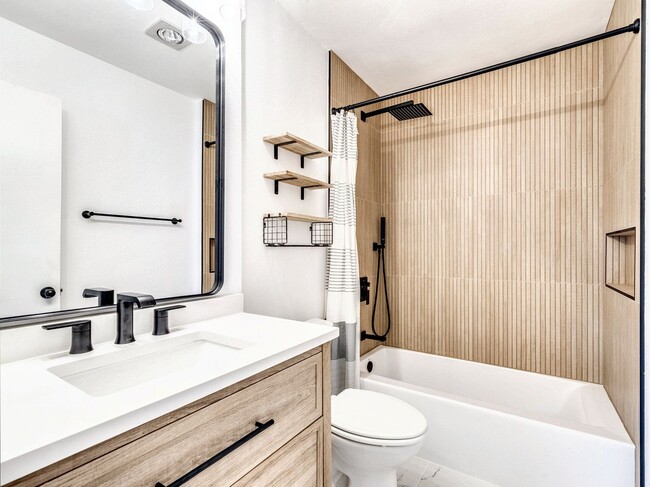 Building Photo - Charming 4BR / 2BA Home Featuring Fireplace, White Cabinets & Big Tree