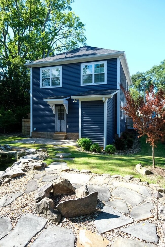 Building Photo - Like-new 3 bedroom, 2.5 bath house with an organic pond!